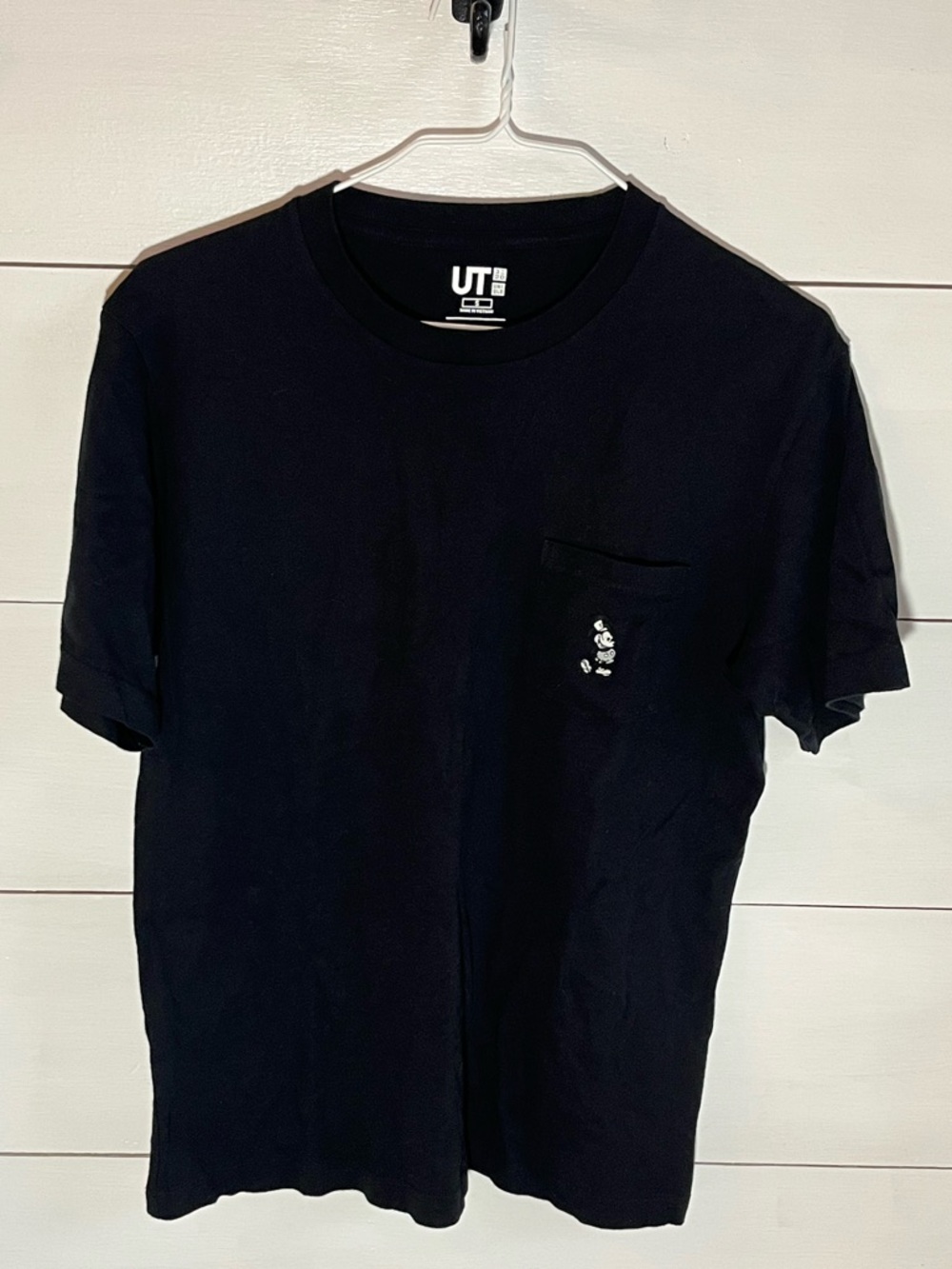 Uniqlo Men's Black Pocket T-Shirt with Subtle Graphic - Mickey Mouse